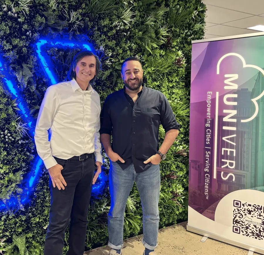 Sam Halcrow with a colleague at an Agilyx event